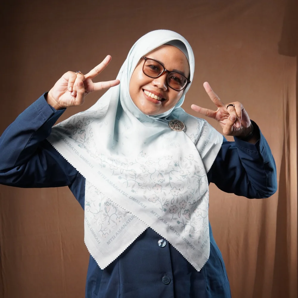 Azmil Mufida, S.Pd., Gr.